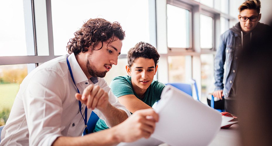 second career teacher tutors young student
