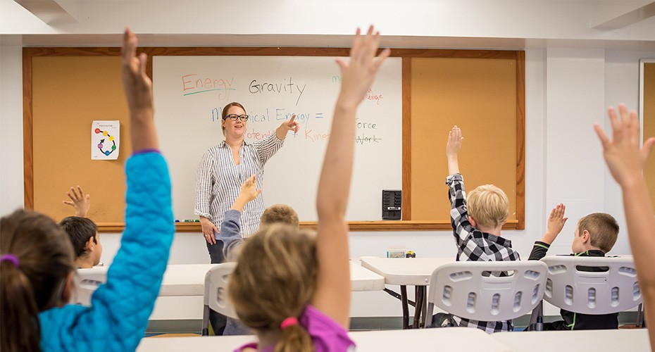 teacher calling on gifted students in special class