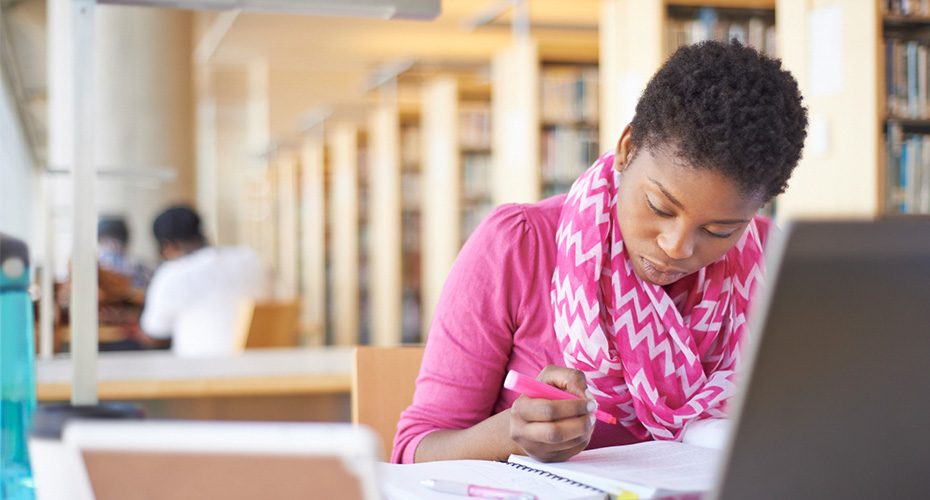 african american female student studying for her master's in education degree