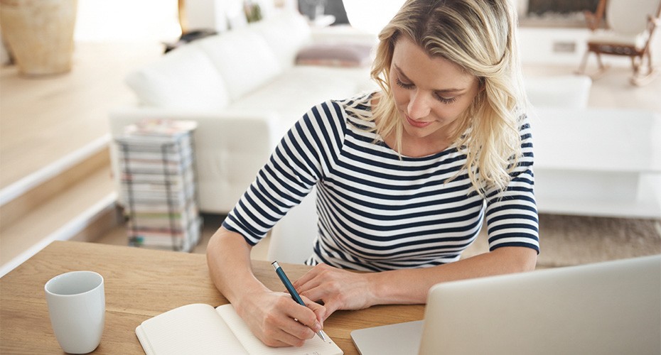 woman studying for her master's in tesol works on an assignment