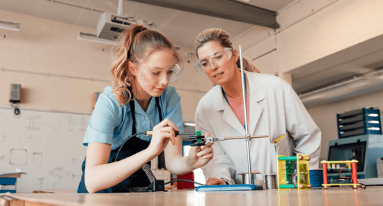 student and teacher in stem science class