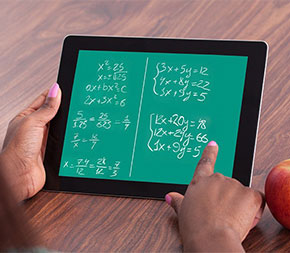 student holding electronic notepad with math equation displayed