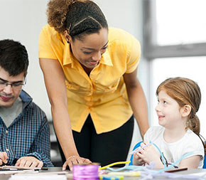 special education teacher with three special needs students