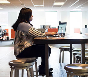 teacher researching online teaching jobs