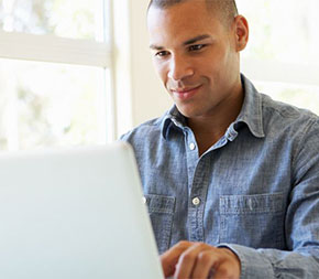 education student researching tips to raise his gre score