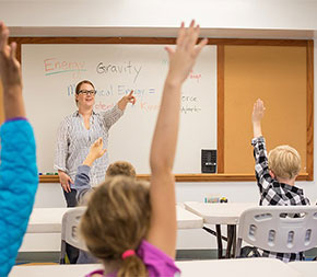teacher calling on gifted students in special class
